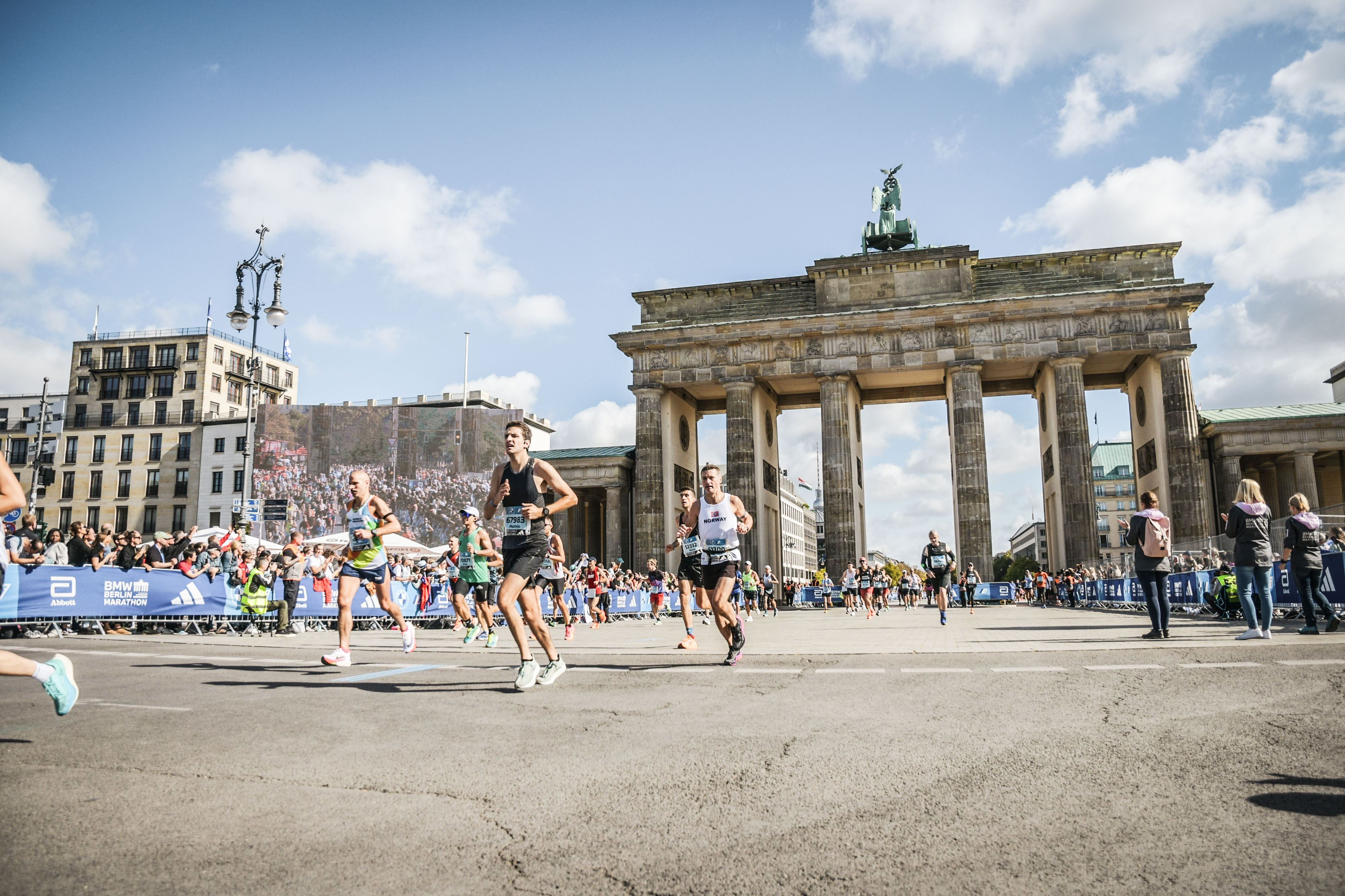 Running in front of the Brandenburg gate