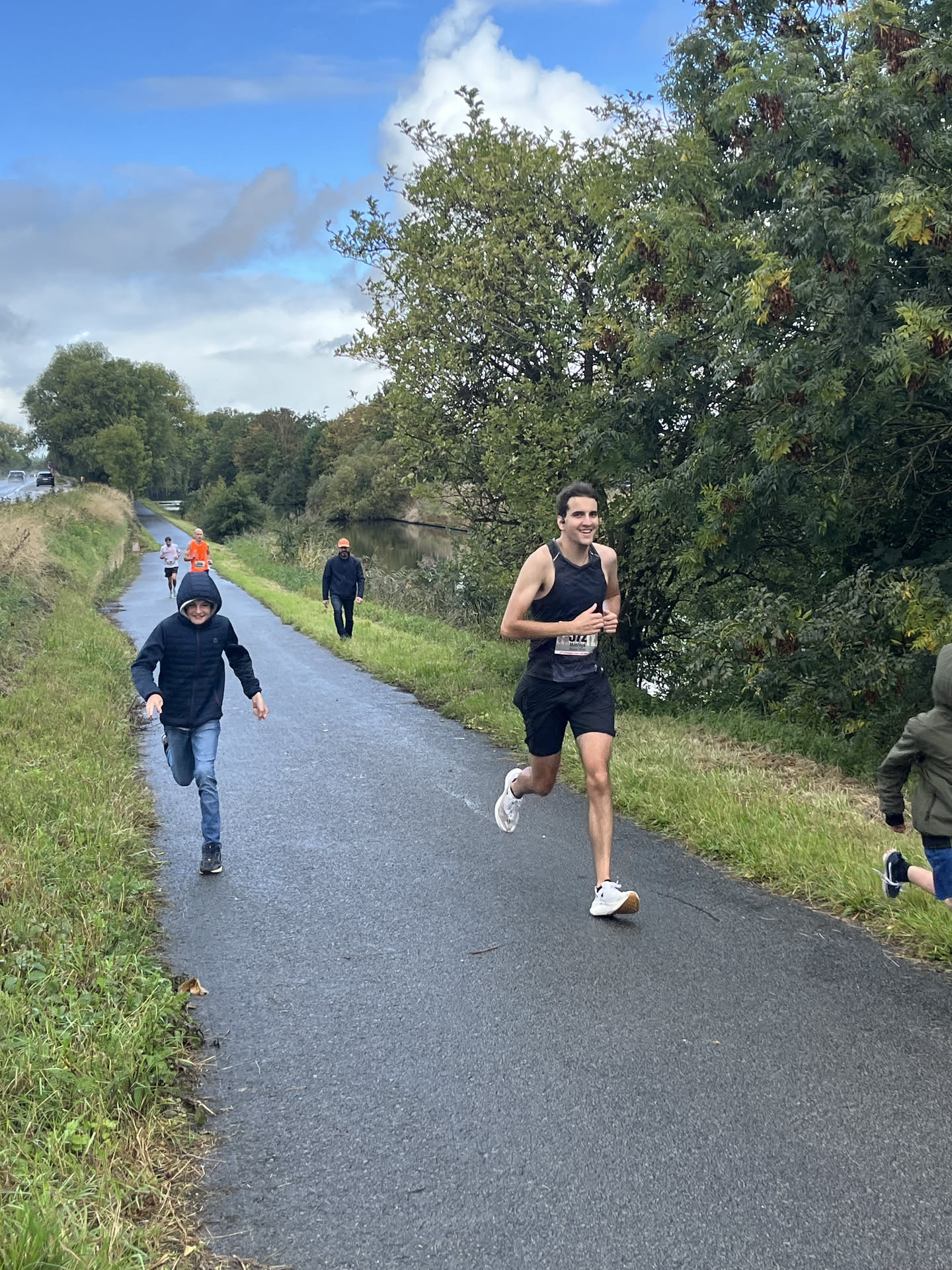 Running up the hill with my sister's kids next to me